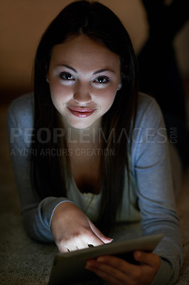 Buy stock photo Portrait of a beautiful teenager working on her digital tablet