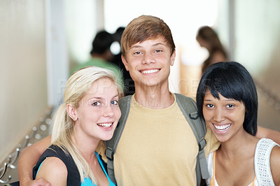 Buy stock photo Teen, friends and hug in hallway at high school for scholarship, study break and learning portrait. Students, girls and boy with backpack at academy for development, education support or class recess