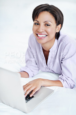 Buy stock photo Portrait, happy and woman in bedroom with laptop, streaming and movie research for weekend break. Smile, female person and relax at house with pc, browsing website and download film for subscription