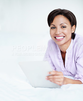Buy stock photo Portrait, smile and woman in bedroom with tablet, streaming and movie research for weekend break. Space, female person and rest in home with tech, browsing website and download film for subscription
