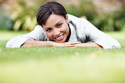 Buy stock photo Happy, relax and woman on grass with portrait, peace and comfortable for summer holiday. Smile, female person or lawn in nature with positive attitude, calm morning and unwind at vacation destination