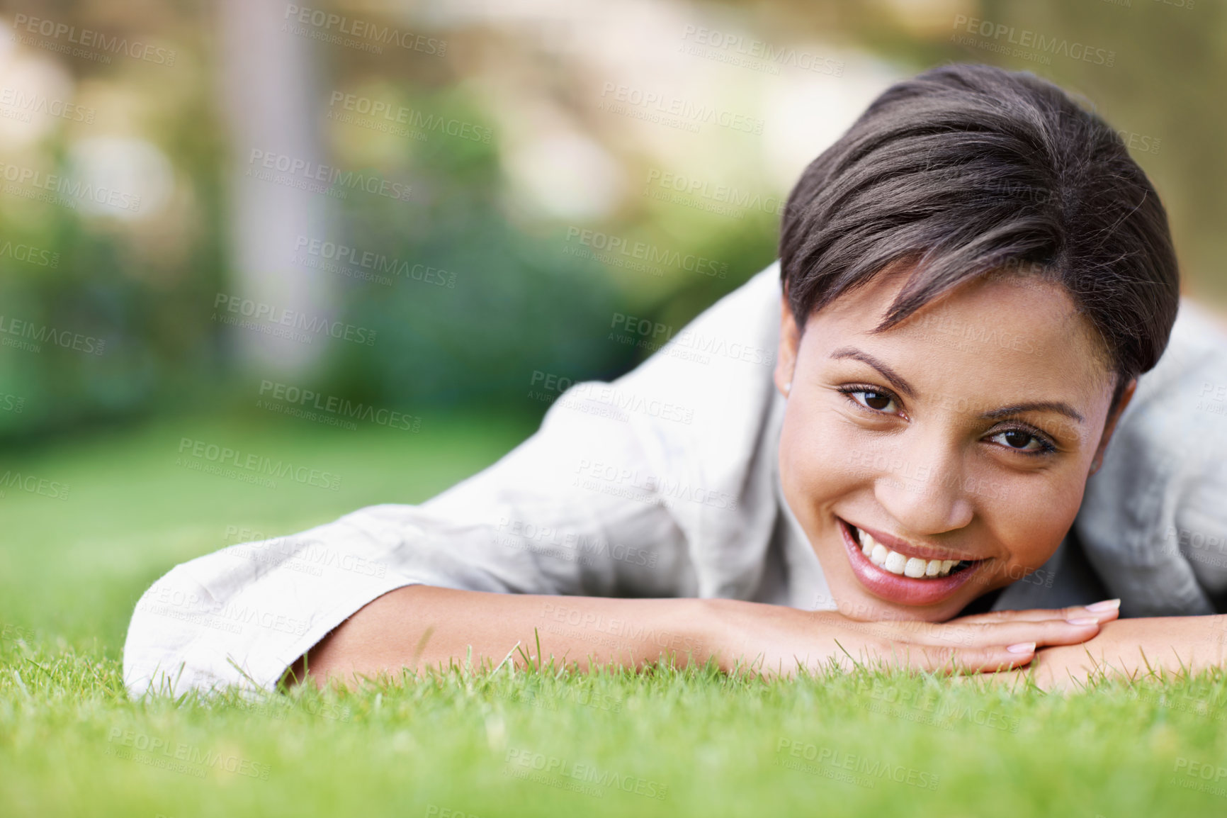 Buy stock photo Happy, rest and woman on grass with portrait, peace and comfortable for summer holiday. Smile, female person and lawn in nature with positive attitude, calm morning and unwind for vacation getaway