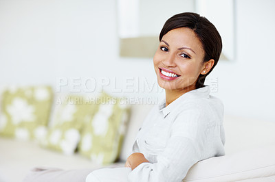 Buy stock photo Sofa, relax and portrait of woman with smile for lazy weekend, calm and peace in house on couch. Home, female person and pride with happiness in living room for morning, comfort and joy in apartment