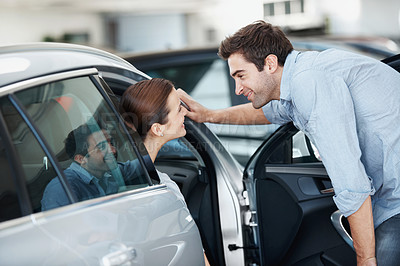 Buy stock photo Love, choice or couple at car dealership with review, decision or automobile selection in showroom. Option, buyers or people with sale, inspection together or vehicle evaluation in happy relationship