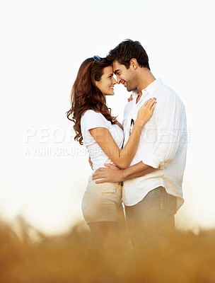 Buy stock photo Love, happy or couple in countryside with hug, partner care or bonding together on summer break. Smile, space or people with forehead touch, relationship connection or romantic moment on outdoor date