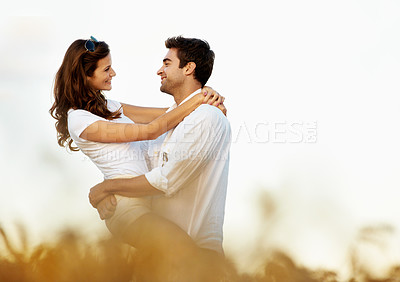 Buy stock photo Love, hug and holiday with couple in field for connection, bonding and spring date together. Support, happiness and marriage anniversary with man and woman in countryside for space and getaway