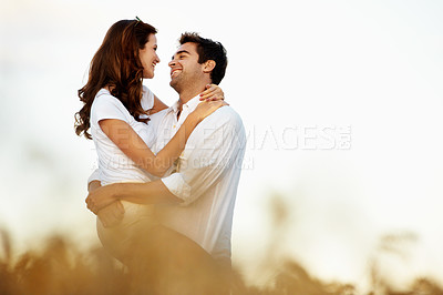 Buy stock photo Love, fun or couple in countryside with hug, happy partner or bonding together on summer break. Relationship, space or people with embrace, romantic connection or playful moment on outdoor date.