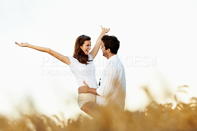 Buy stock photo Love, freedom and smile with couple in field for connection, bonding and spring date together. Support, happiness and marriage anniversary with man and woman in countryside for care and getaway