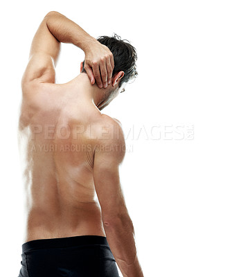 Buy stock photo Massage, neck and pain with man in studio for muscle inflammation, fibromyalgia and fatigue. Osteoarthritis, tendinitis and pressure with person on white background for back, anatomy and strain space