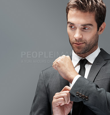 Buy stock photo Thinking, space and cufflink with business man in studio for reflection, stock broker and trader confidence. Vision, account manager and professional with person on gray background for investor idea