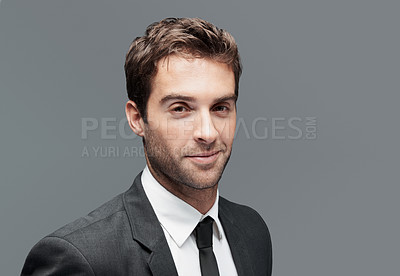 Buy stock photo Smile, professional and portrait of business man in studio for about us, corporate and financial advisor. Portfolio manager, broker and confidence with male employee on gray background for pride