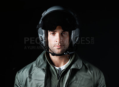 Buy stock photo Hero, soldier and pilot with portrait of man in studio for army militant, war veteran and aerial combat expert. Airspace mission, aviator and military with person on black background for security
