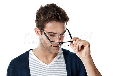 Buy stock photo Man, glasses and frames in studio with eyewear decision, consider prescription lens and eye health. Person, check spectacles and eyesight with optometry, thinking or clear vision on white background.