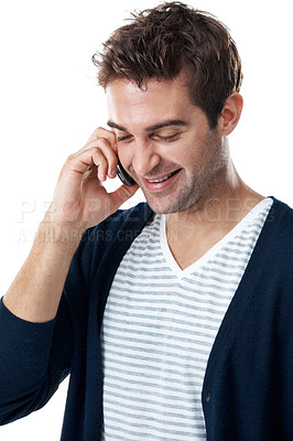Buy stock photo Studio, phone call and man with smile, talking and communication with contact and network with tech. White background, discussion and person with mobile, laugh and listening to funny chat and gossip
