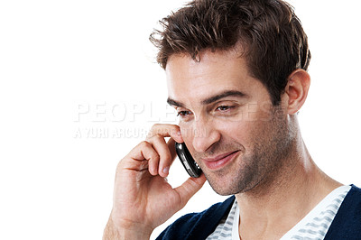 Buy stock photo Studio, phone call and man with smile, chatting and communication with contact and network with tech. White background, discussion and person with mobile, space and gossip on break and conversation