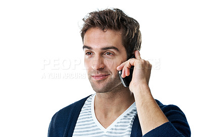 Buy stock photo Phone call, chat and man in studio, gossip and communication with contact or network with technology. White background, discussion and person with mobile, happy and listening to conversation on break