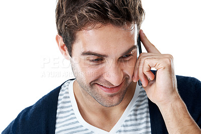 Buy stock photo Happy, conversation and man in studio for phone call, online chat and listening for communication. Smile, connection and person on cellphone for speaking, contact and networking on white background