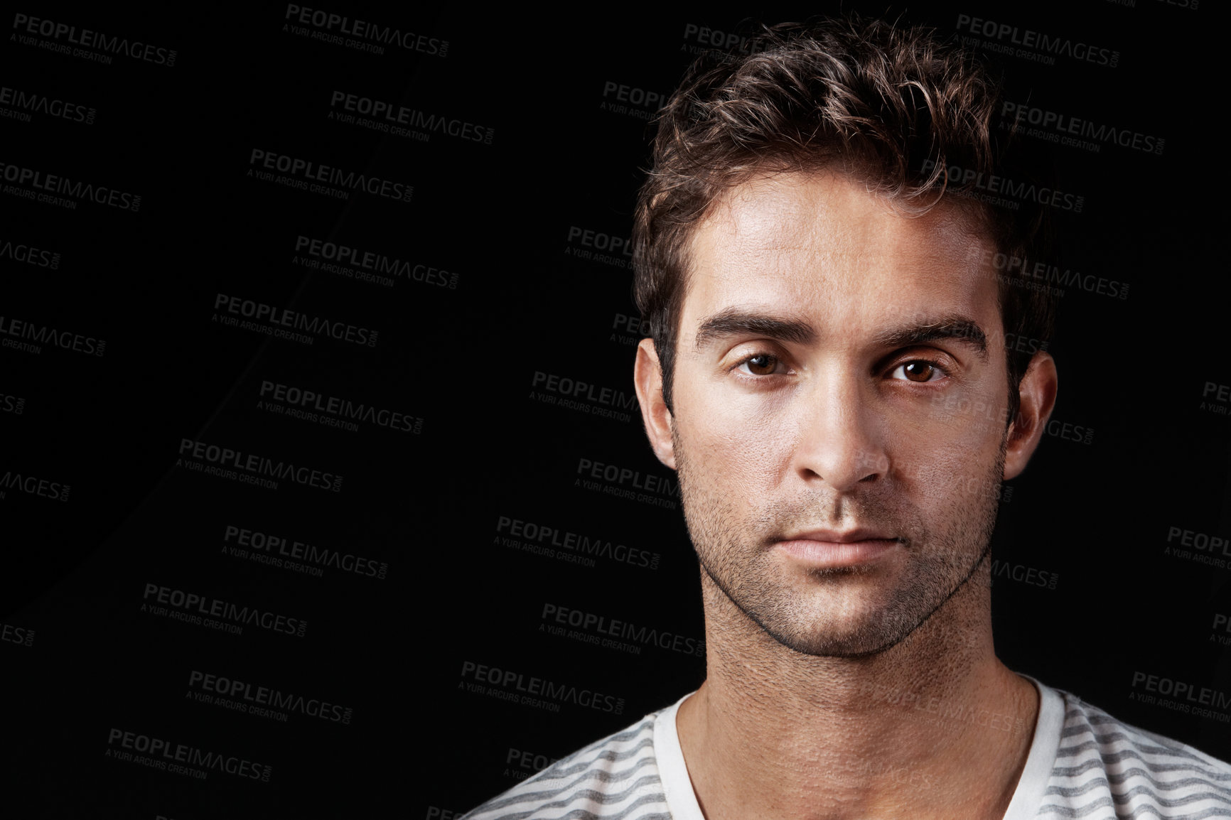 Buy stock photo Serious, man and designer in studio with portrait, career pride and about us for clothing launch. Mockup space, person and entrepreneur with ambition, attitude and apparel tailor on dark background