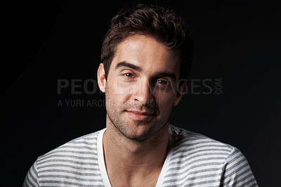 Buy stock photo Confident, man and designer in studio with smile, career pride and about us for clothes launch. Portrait, person or entrepreneur with ambition, positive attitude and apparel tailor on dark background