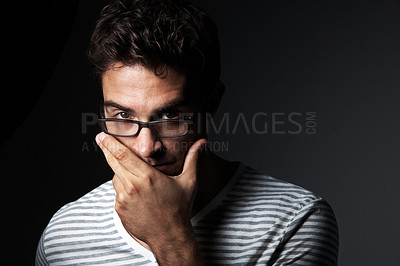 Buy stock photo Glasses, space and portrait of man in studio for vision, eyewear style and aesthetic for fashion. Confident, hipster and person with trendy frames, prescription lens and spectacles on dark background