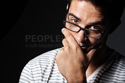 Buy stock photo Glasses, confident and portrait of man in studio for vision, eyewear style and aesthetic for fashion. Hipster, space and person with trendy frames, prescription lens and spectacles on dark background