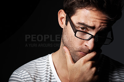 Buy stock photo Glasses, smart and portrait of man in studio for vision, eyewear style and nerd for hipster fashion. Intellectual, space and person with frames, prescription lens or spectacles on dark background