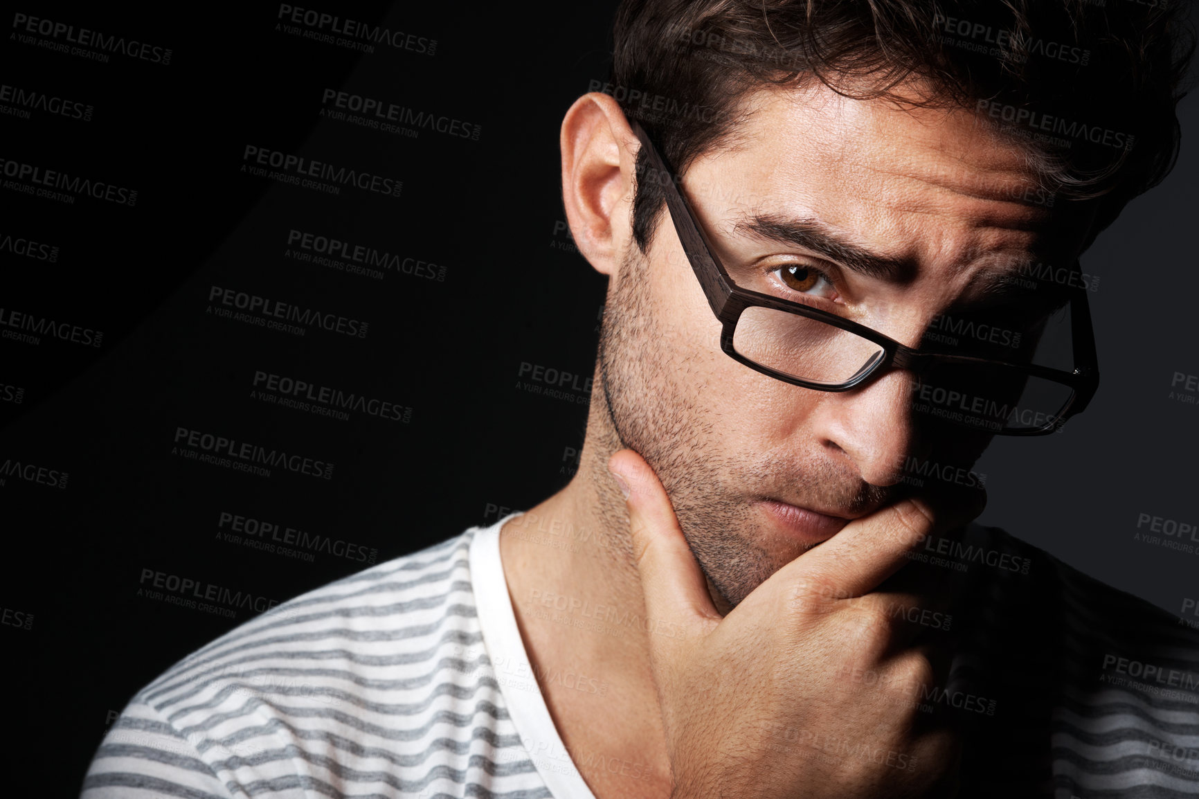 Buy stock photo Glasses, smart and portrait of man in studio for vision, eyewear style and nerd for hipster fashion. Intellectual, space and person with frames, prescription lens or spectacles on dark background