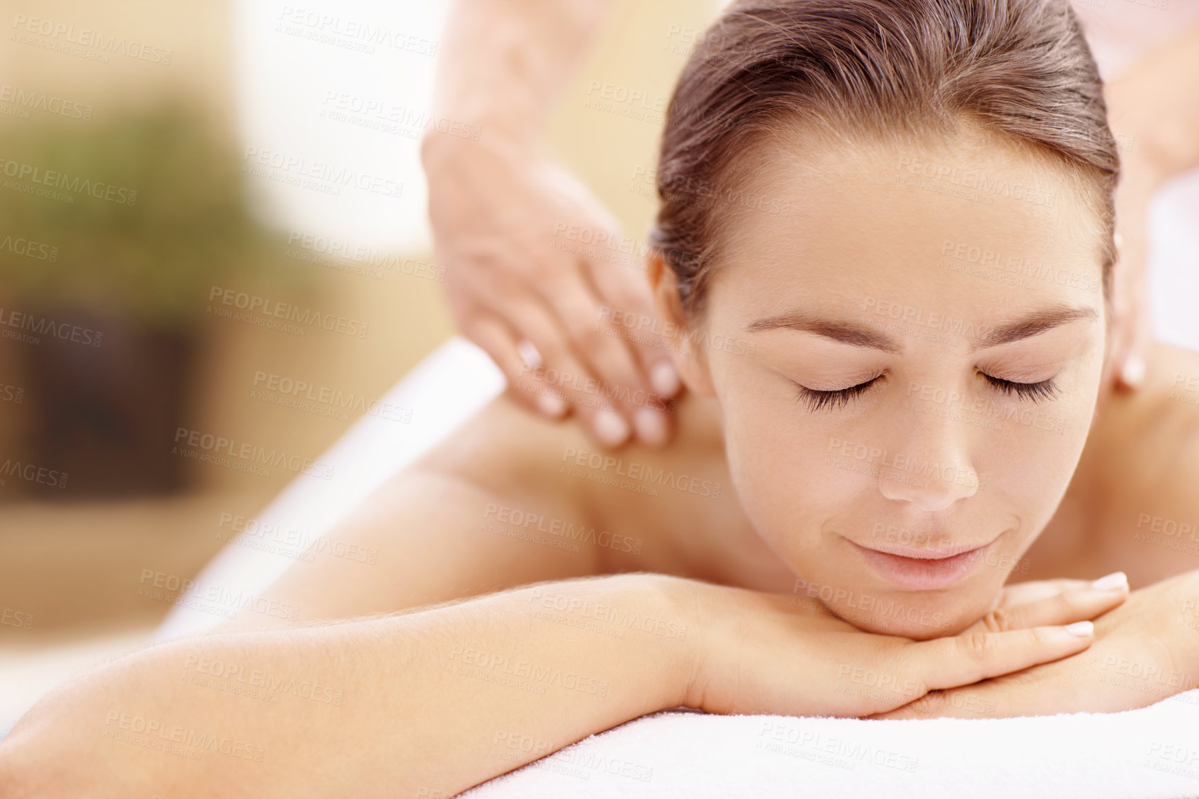 Buy stock photo Calm, woman and relax with back massage at spa for muscle tension, luxury treatment or deep tissue. Client, beauty therapist and body pamper at wellness resort for healing therapy, zen or pain relief