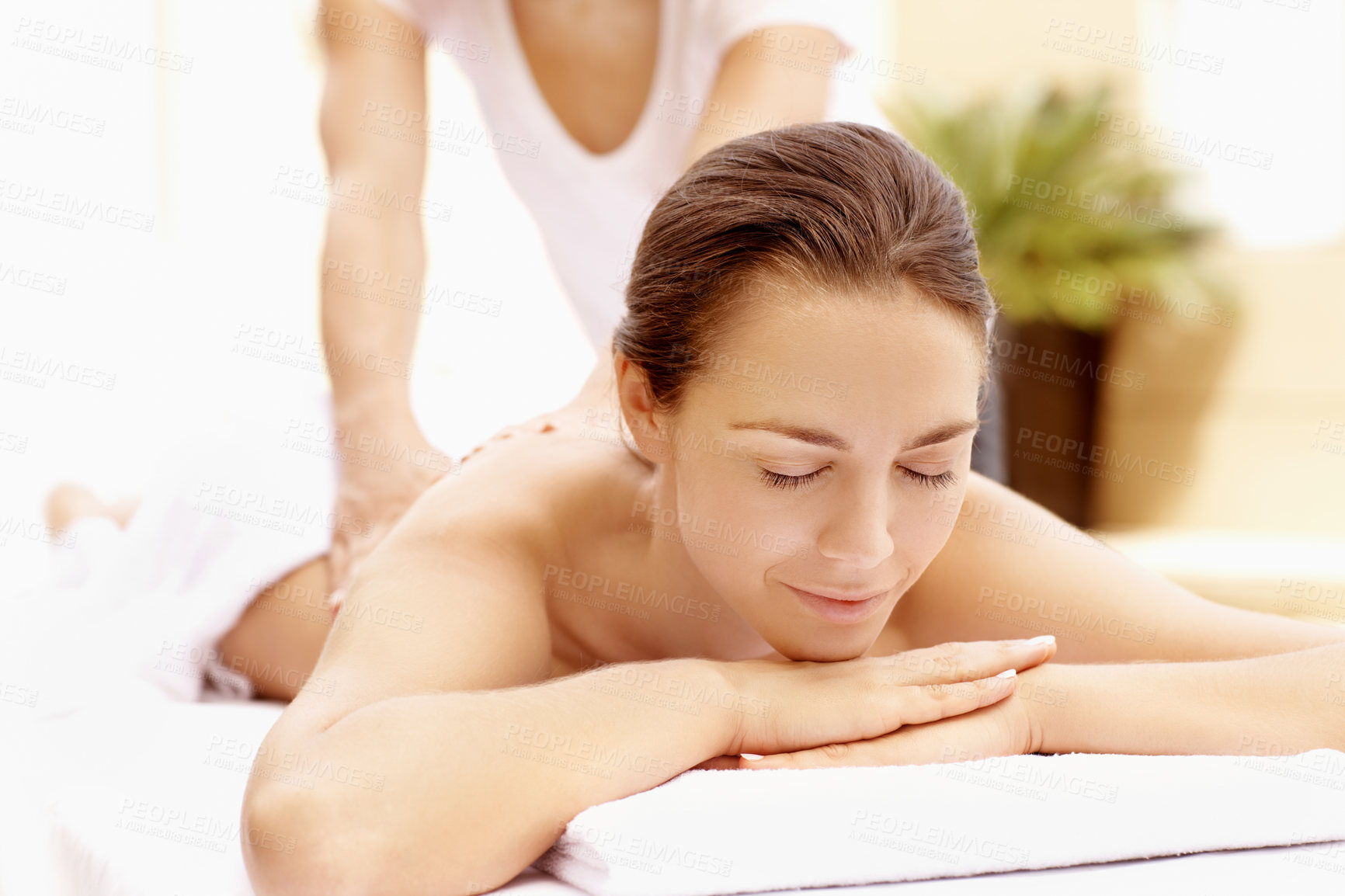 Buy stock photo Back massage, relax and spa with woman at hotel for stress relief, deep tissue treatment and wellness. Holistic detox, hospitality and muscle therapy with masseuse and person at resort for pamper