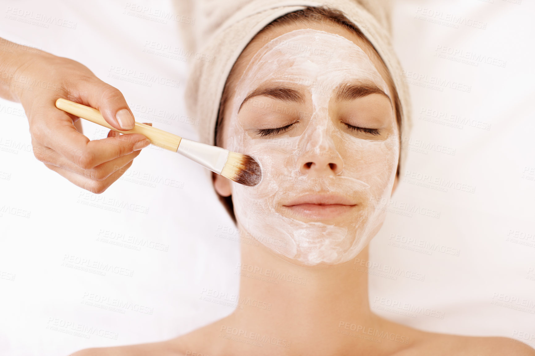 Buy stock photo Skincare, facial and brush with woman in spa for pore detox, relax or deep cleaning cosmetics. Clay treatment, beauty glow and face mask with above of person and hands in salon for purifying minerals