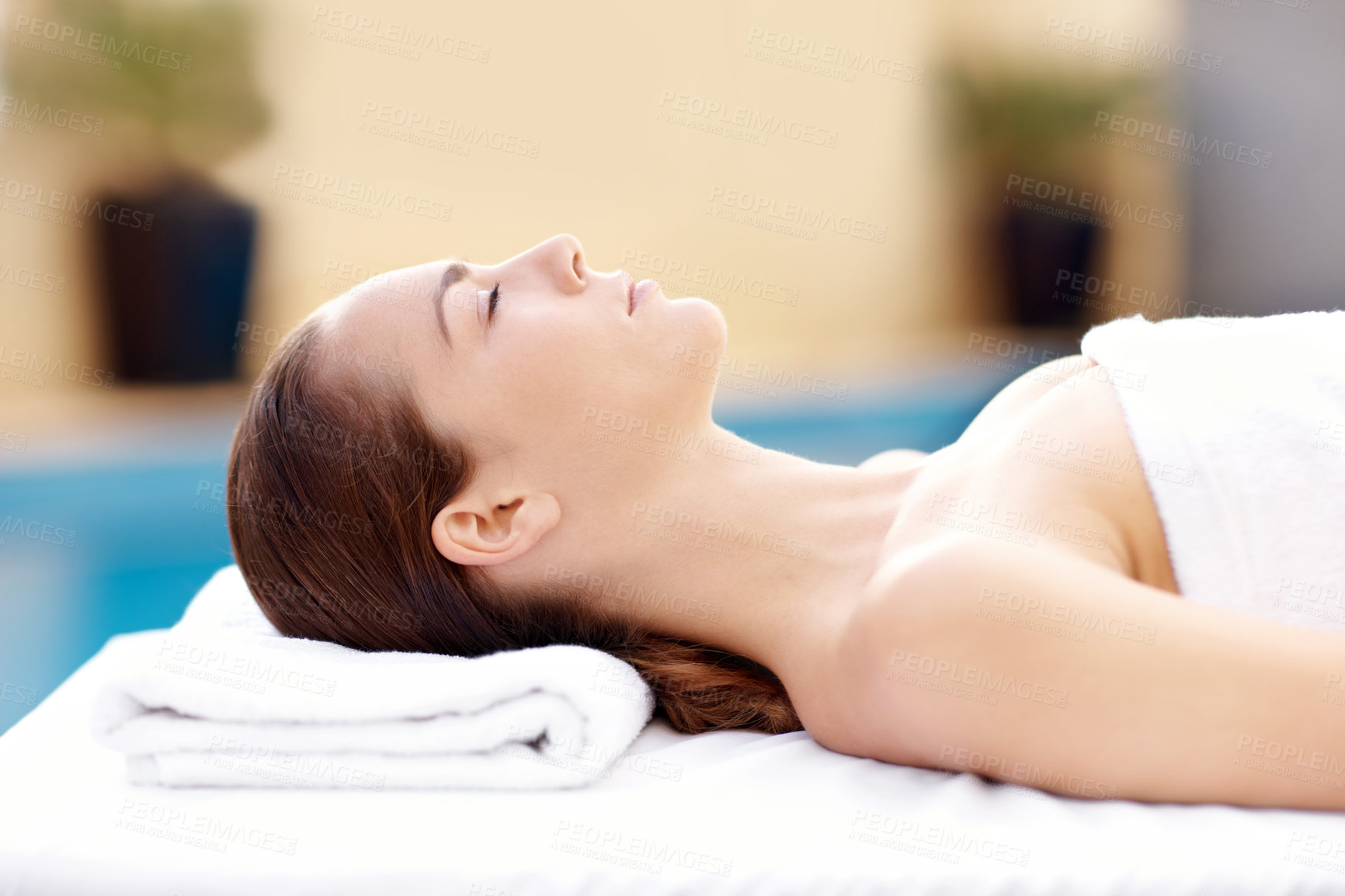 Buy stock photo Relax, spa and peace with woman at hotel for calm, deep tissue massage and beauty treatment. Holistic detox, hospitality and healing retreat with person at resort for body care, zen and wellness