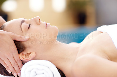 Buy stock photo Profile shot of a beautiful woman receiving a massaging spa treatment from a therapist 