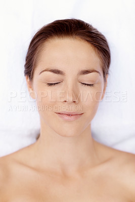 Buy stock photo Beautiful woman waiting for her spa treatment to begin with a smile - portrait 