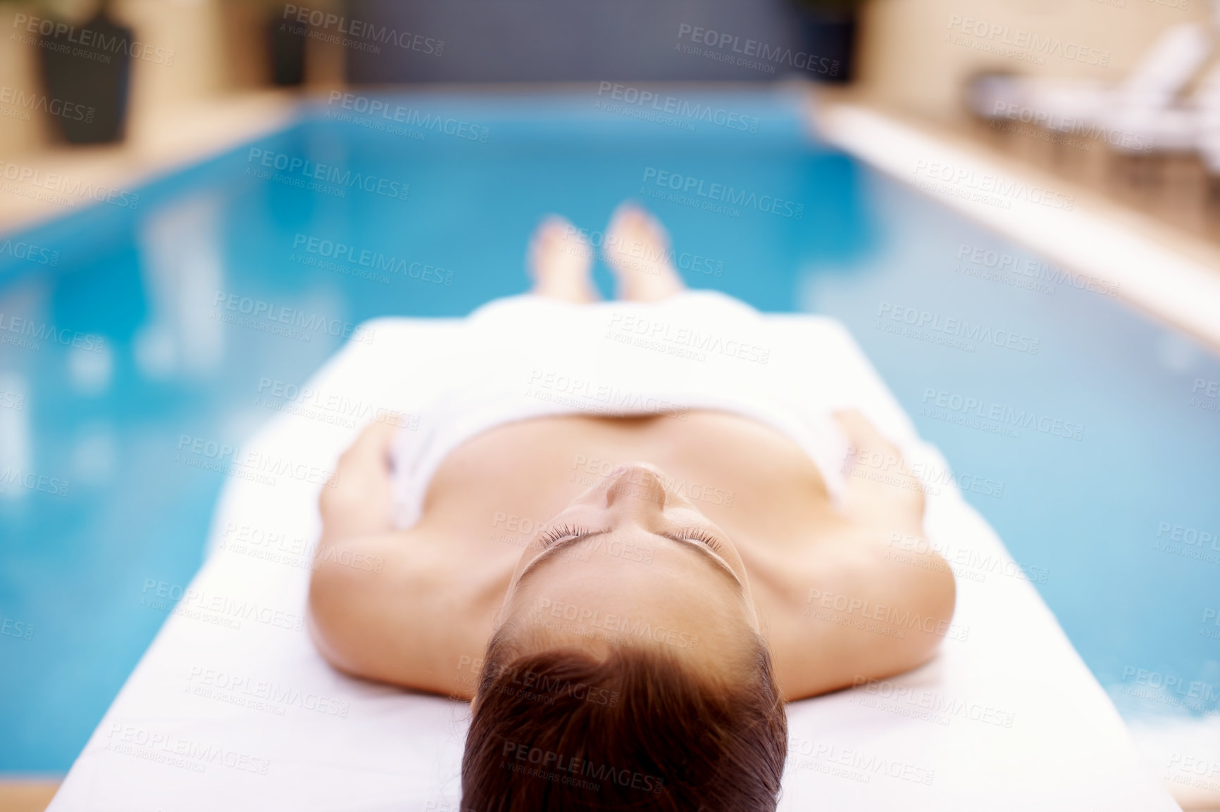 Buy stock photo Relax, spa and pool with woman at hotel for calm, skincare service and beauty treatment. Holistic detox, hospitality and healing retreat with female person at resort for body care, peace and salon