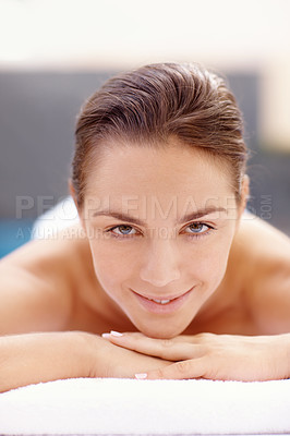 Buy stock photo Pretty woman waiting for her spa treatment to begin with a smile - portrait 