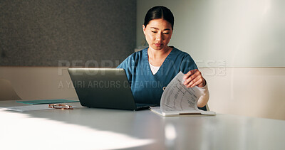 Buy stock photo Nurse, paperwork and woman with laptop in clinic, administration or reading medical records on web. Healthcare, information and asian person with tech for test results, documents or hospital research