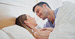 Chill, smile or couple in bed with love, romantic moment or bonding together on weekend break. Relaxing, comfy or people in house with cuddle, partner care or tender connection in happy relationship.