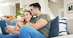 Kiss, tablet and couple in home with love, booking vacation or planning trip on sofa together. Tech, man and happy woman hug in lounge, holding hands or romantic connection with holiday itinerary