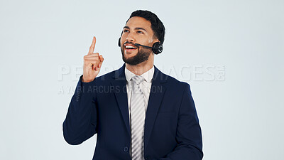Buy stock photo Headset, thinking and man in studio for call center, contact us and business information on space. Mockup, happy and person with idea, gesture and thoughtful for customer support on white background
