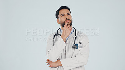 Buy stock photo Thinking, doctor and man in studio, healthcare insight or vision on white background with mockup space. Thoughts, medical worker and person planning with idea, problem solving or wellness decision