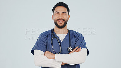 Buy stock photo Happy, portrait and doctor in studio with arms crossed, ambition or about us in medical industry. Healthcare, pride or man with confidence, career growth or wellness practitioner on white background.