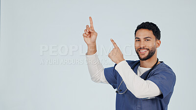 Buy stock photo Medical, point or nurse in studio with smile, treatment list or reminder in healthcare information. Mockup space, doctor or man with instruction, recovery plan or wellness insight on white background