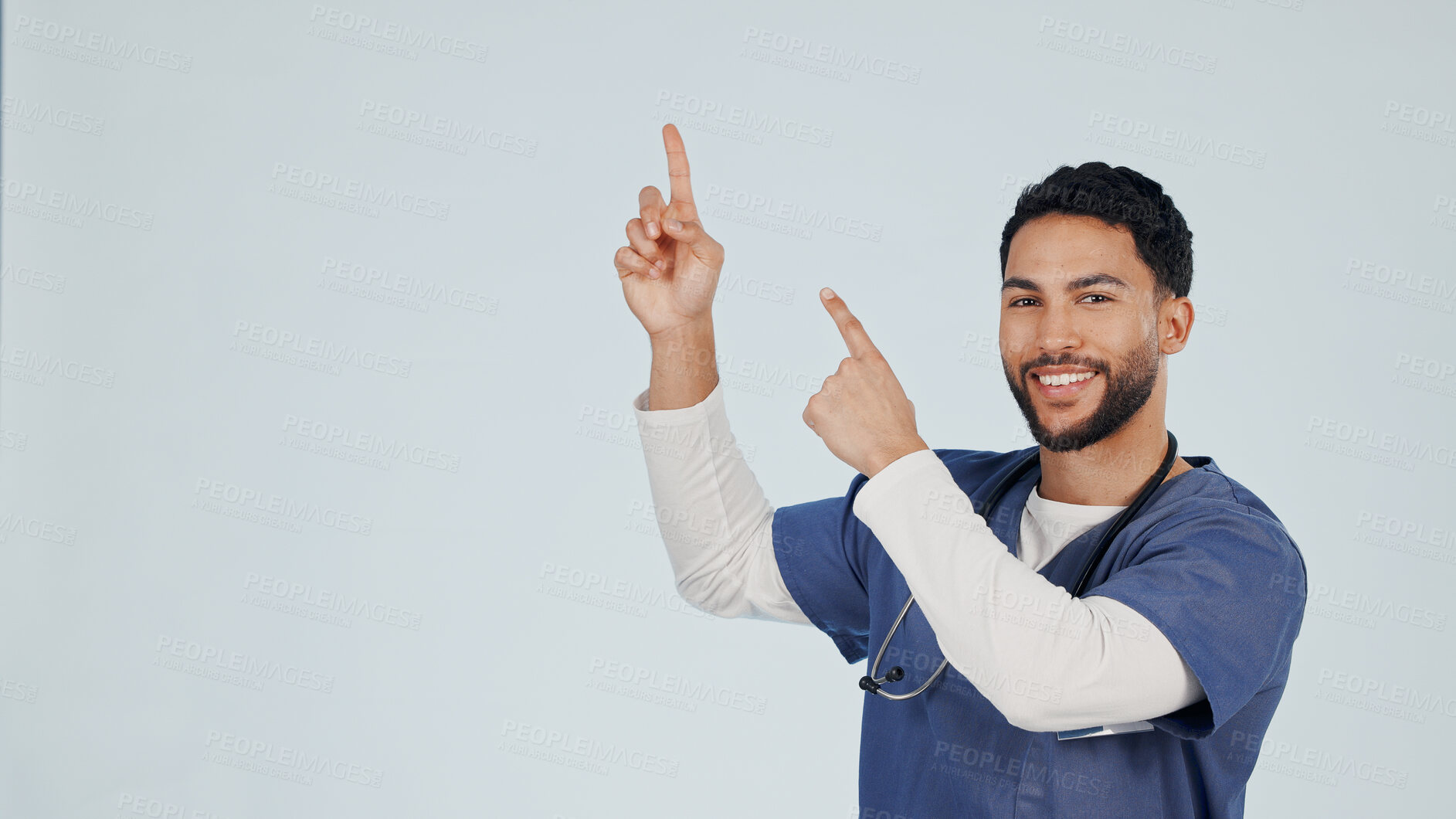 Buy stock photo Medical, point or nurse in studio with smile, treatment list or reminder in healthcare information. Mockup space, doctor or man with instruction, recovery plan or wellness insight on white background