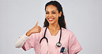 Thumbs up, nurse and portrait of woman in studio for healthcare, vaccine promotion and success. Medical agreement, like and thank you with person on white background for encouragement and smile