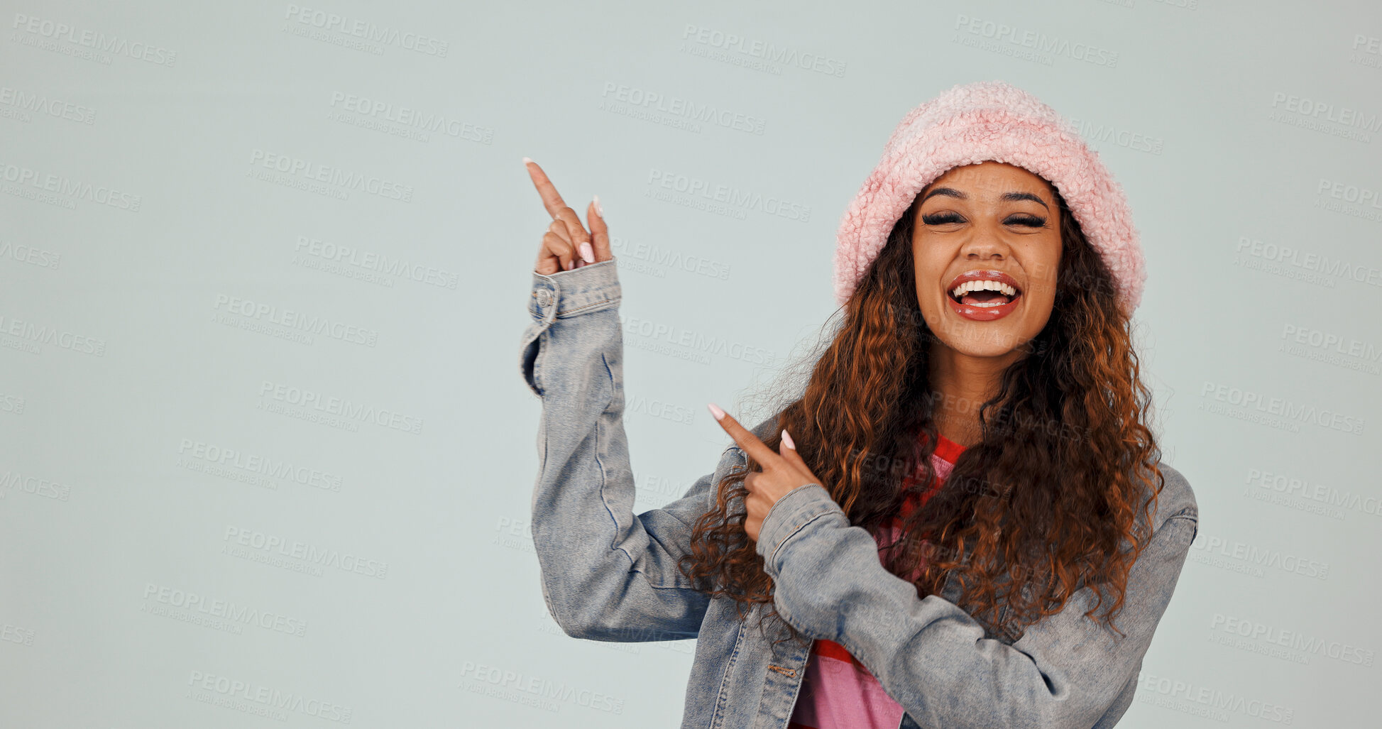 Buy stock photo Studio, portrait and woman with promotion, pointing and excited for discount offer or recommendation. White background, space and happy person with gesture, advertising and sale deal announcement