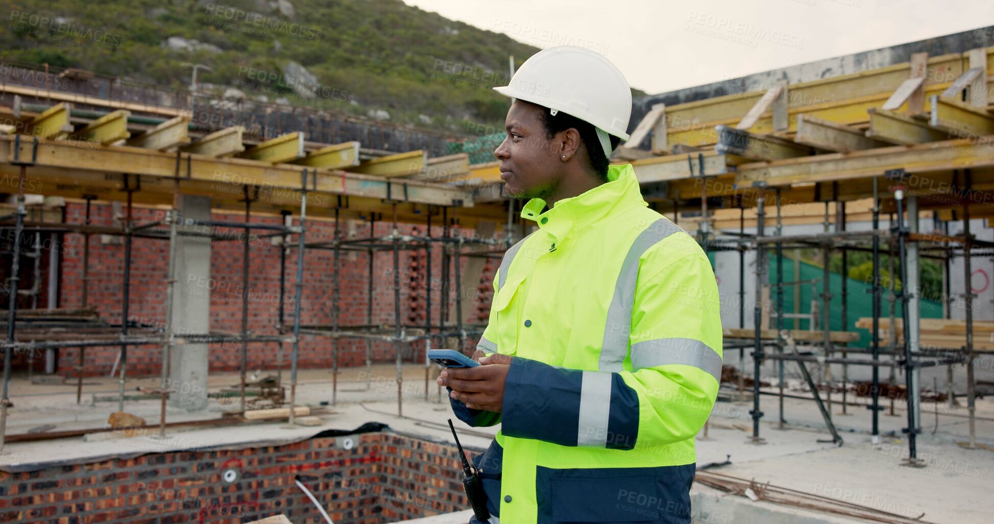 Buy stock photo Architect, thinking and man with phone on roof, building inspection or planning for home renovation. Civil engineer, reflection and black person with mobile, construction and property development