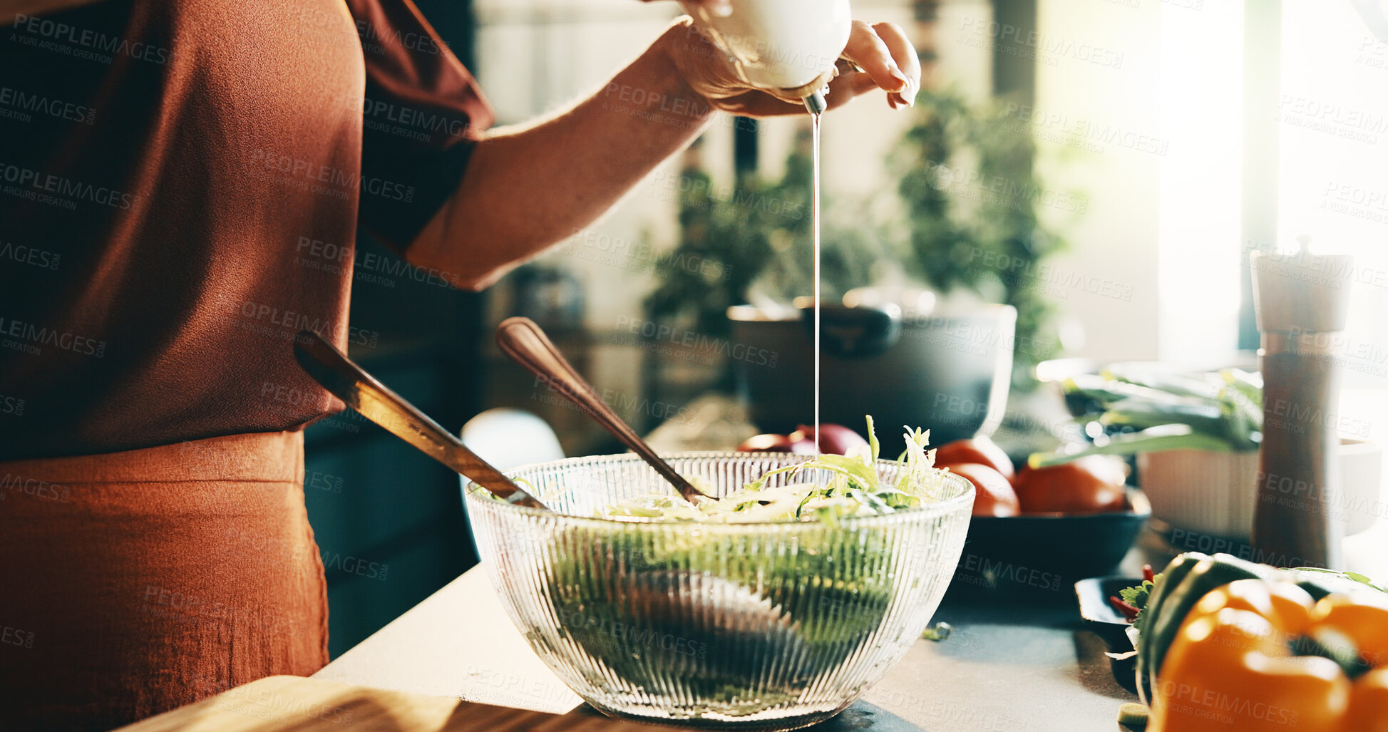 Buy stock photo Salad, olive oil and hands of woman in kitchen at house for nutrition, health or diet meal. Vegetables, food dressing and female person with fresh ingredients for wellness, dinner or dish in home.