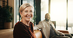 Happy, relax and portrait with couple on sofa in home for bonding, weekend or holiday together. Interracial relationship, man and mature woman with smile on living room couch for break in house