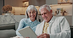 Senior, home and happy couple with tablet on sofa for entertainment, network or online app. Elderly, man and woman with smile or technology for streaming, internet or connection together in house