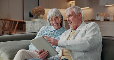 Buy stock photo Senior, tablet and sofa with happy couple in home for entertainment or online streaming together. Elderly, man and woman with smile or technology for subscription app, network or conenction in house